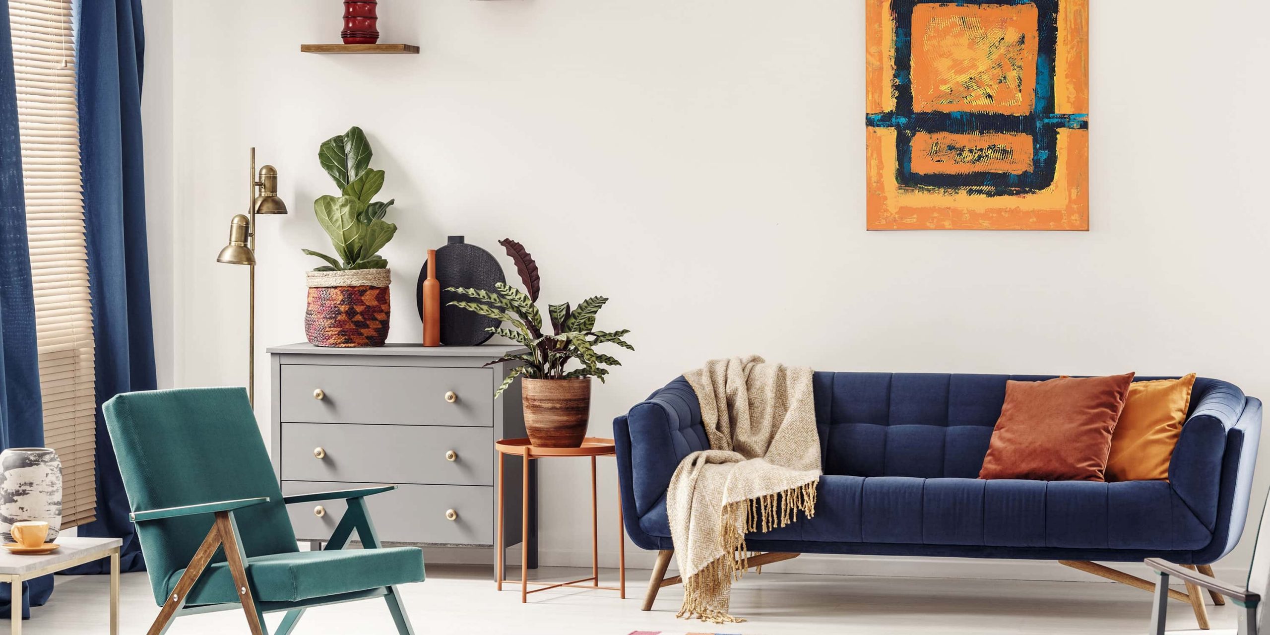 Living room with couch and tables.