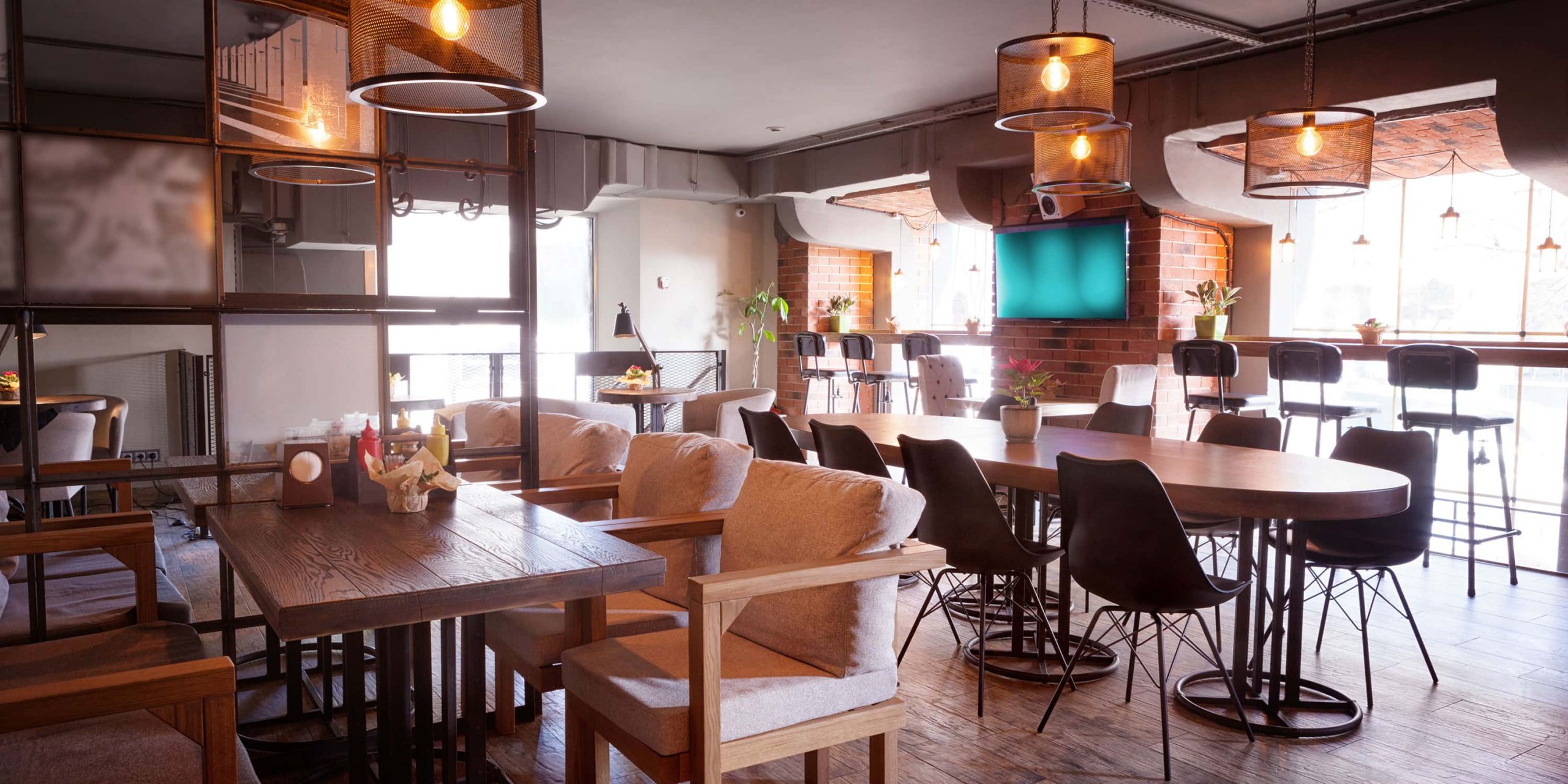 Restaurant dinning room with table and chairs.